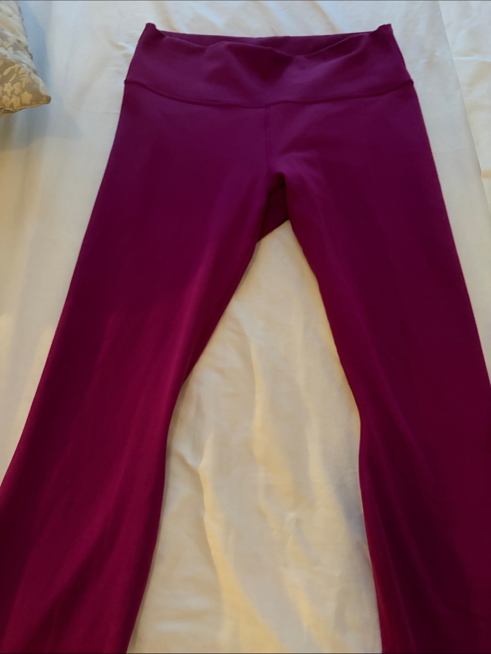 Fabletics Deep magentaPerformance Leggings straight leg flare cut at the bottom